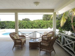Alamanda Villa's L-Shaped Patio Around The Pool.